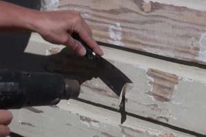 photo stripping siding paint with a heat gun