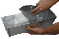 photo demonstrating how to handle joint compound for finishing drywall seams