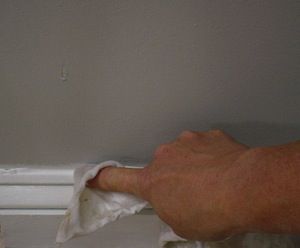 photo demonstrating how to smooth out a bead of caulk