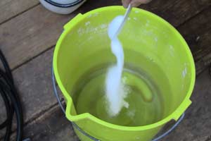 photo mixing oxygen bleach in warm water