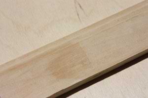 photo of paint-grade wood baseboard molding with finger-joints