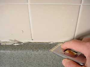 fixing cracks in drywall with caulk