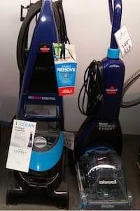 photo of two upright carpet steamer