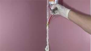 photo of foam filling a wall crack
